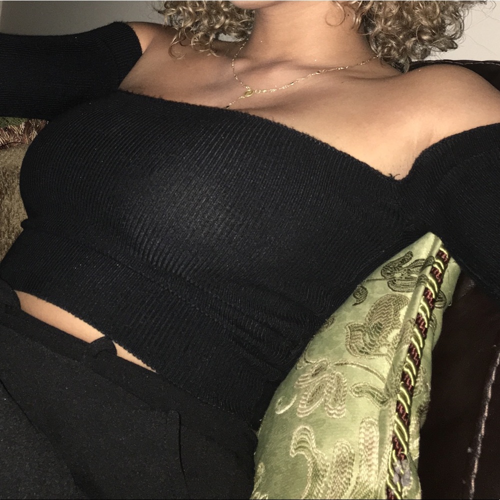 Black long sleeve, over the shoulder